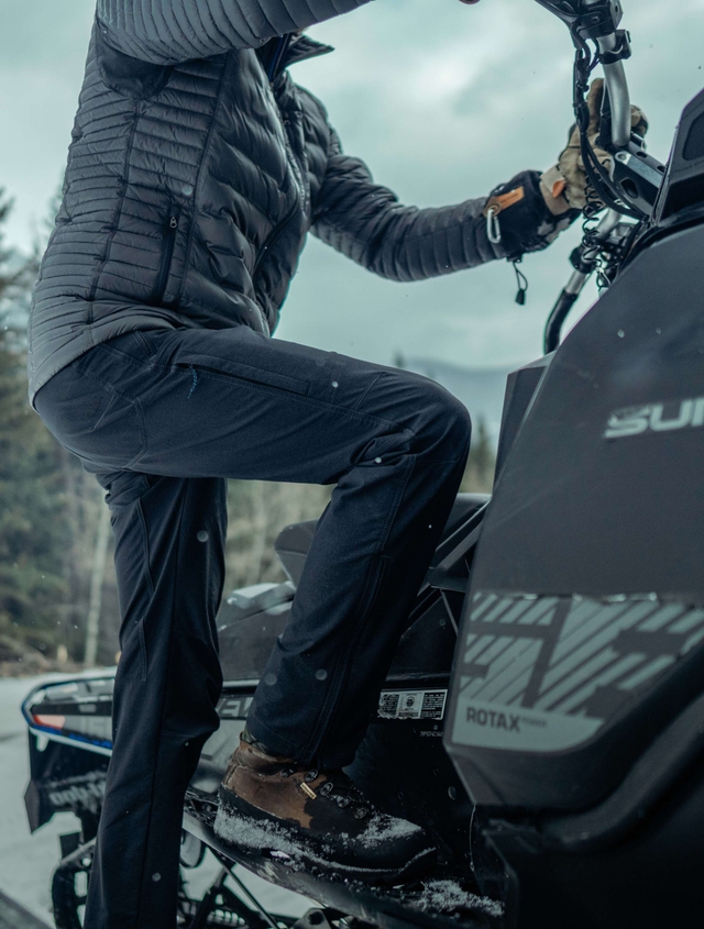 Man loading his car wearing Spyfire jacket.