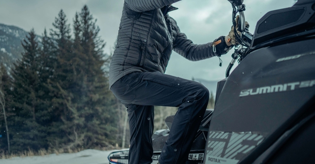Man loading his car wearing Spyfire jacket.