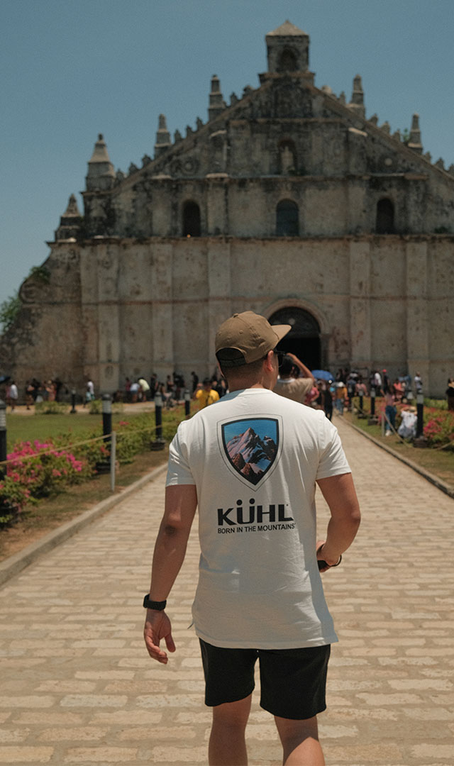 Ryan walking to a temple building in Philippines 