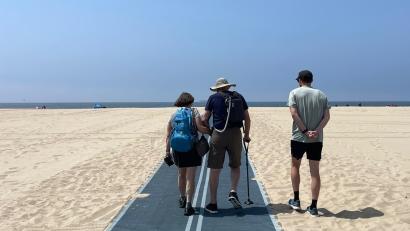 Huntington Beach Sandy, Ira, and Jordan Bornstein walking toward the Pacific Ocean