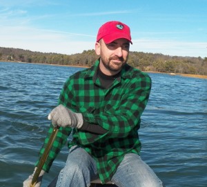 Justin Chase paddling his canoe