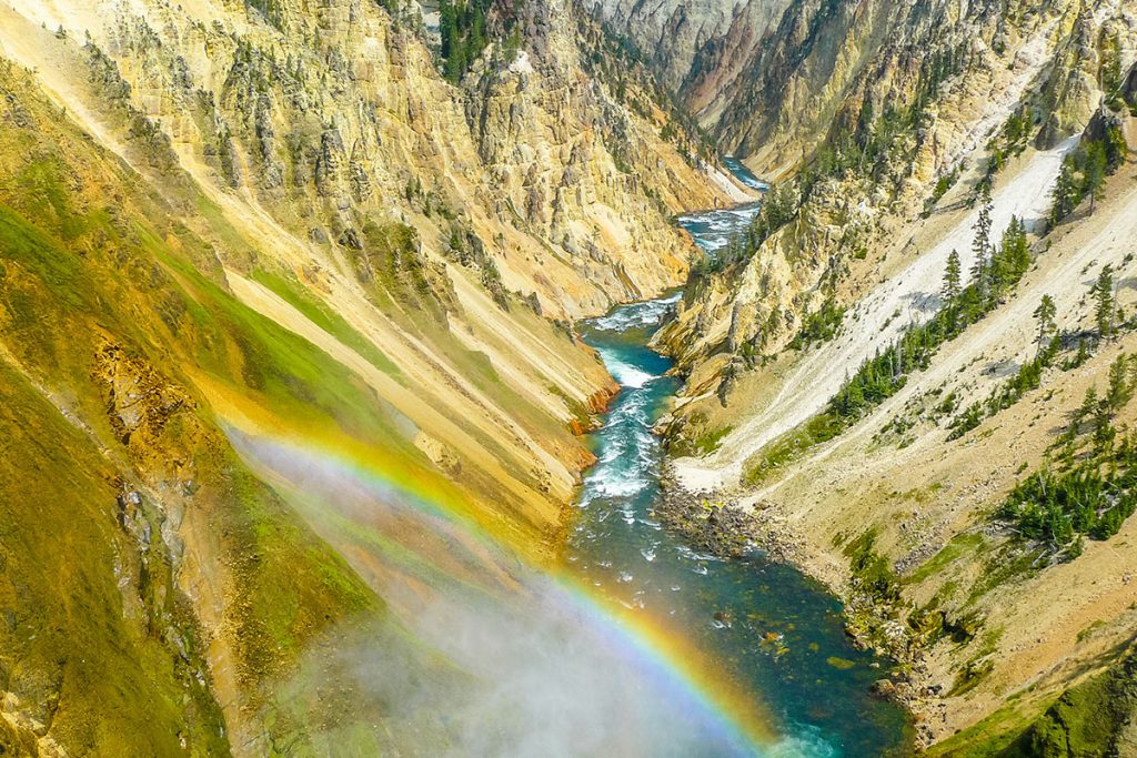 Inspiration point Yellowstone waterfall with rainbow