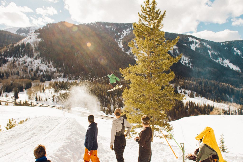 Benefits of Cold Weather Outdoor Activities 1 A group of people on mountain peak during daytime.