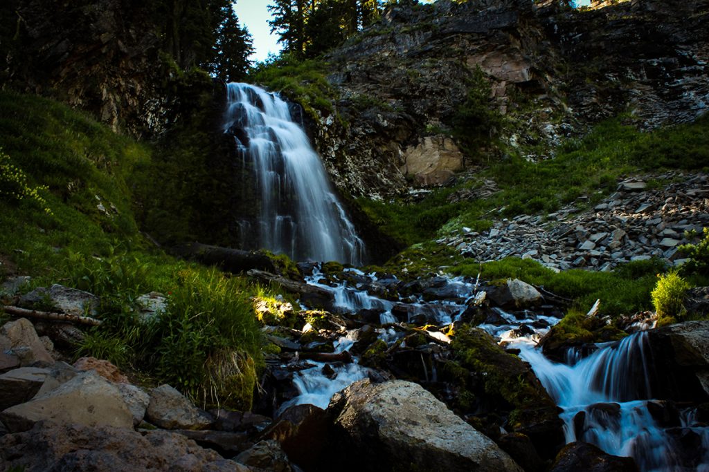 waterfall on rocks and moss