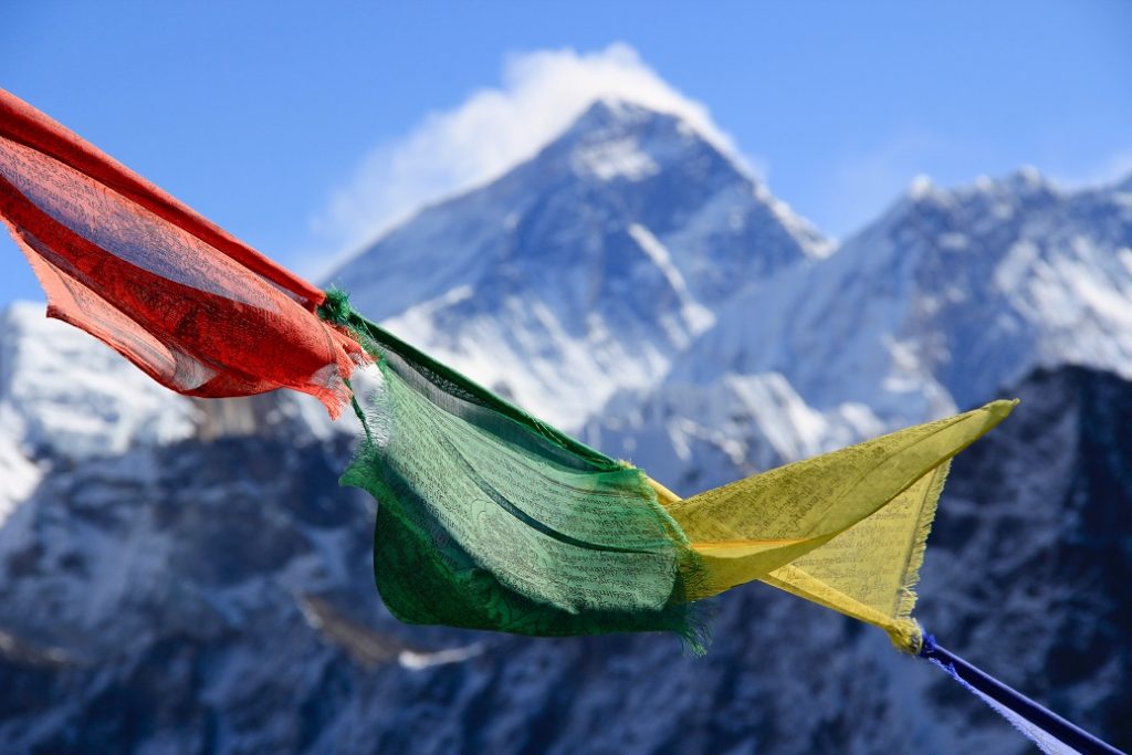 Everest 2019 - Flags with Everest in the background