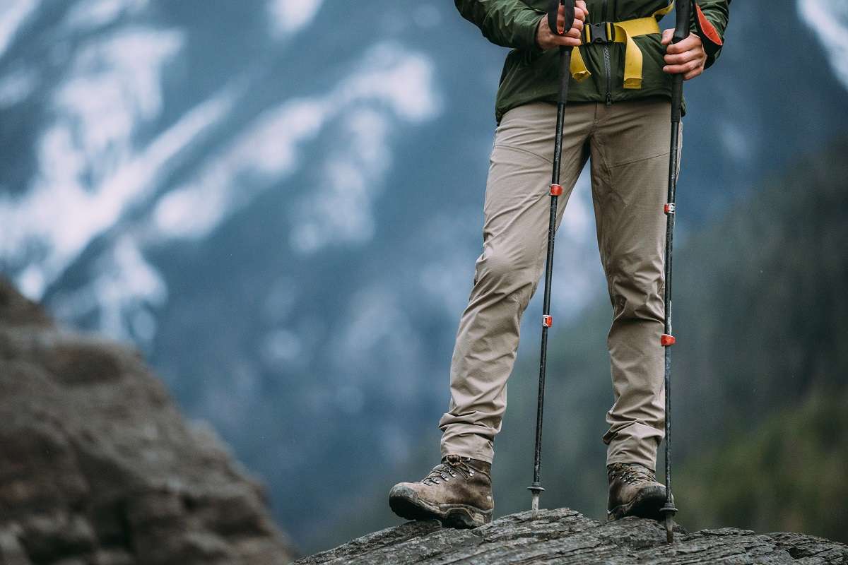 17 Winter Camping Items You'll Only Forget Once 2 man standing with trekking poles