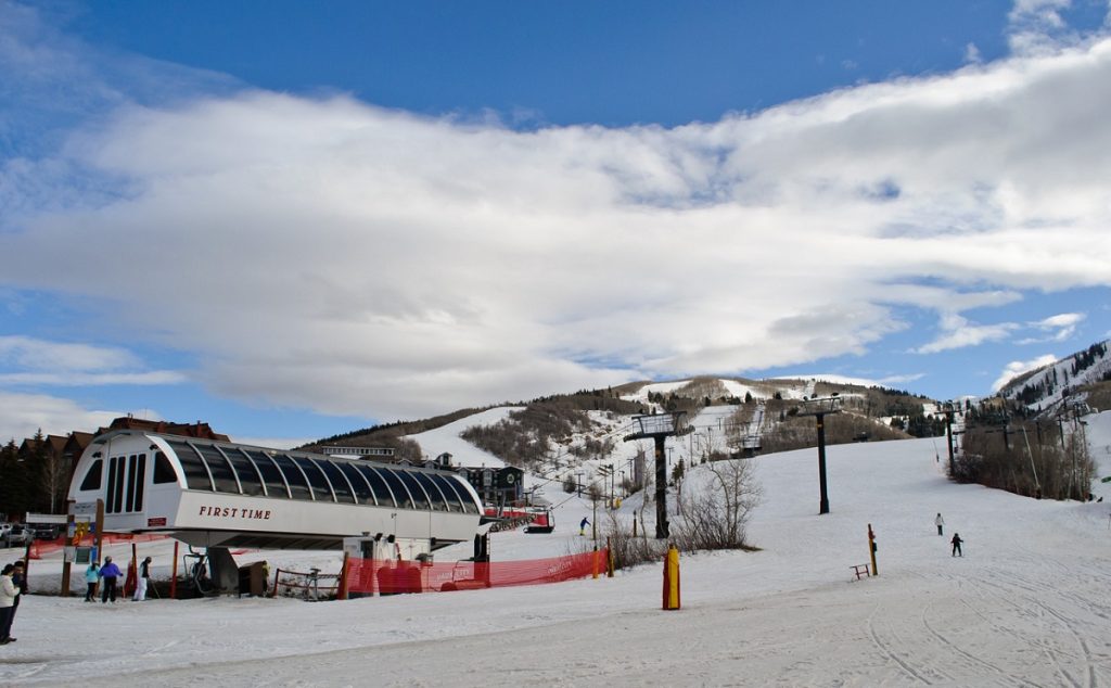 white ski lift on snowy grounds