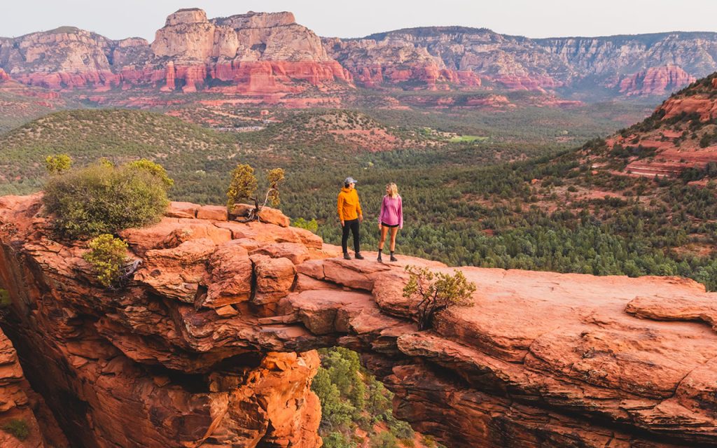 man in yellow K&Uuml;HL jacket standing on devils bridge
