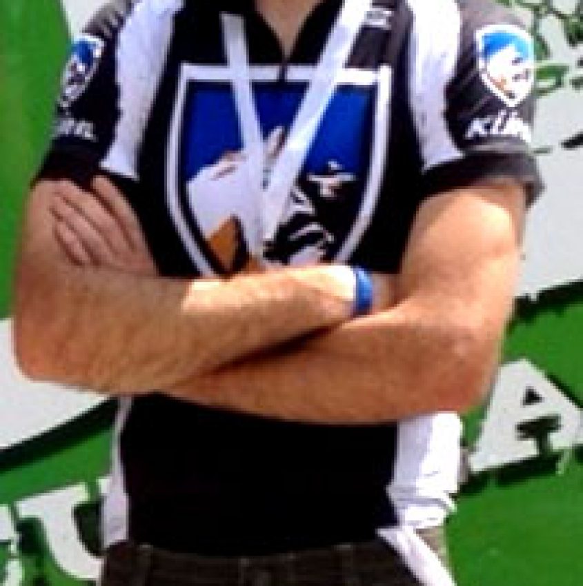 Christian standing on the podium of an Intermountain Cup race