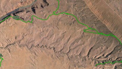 The green is the PRT, notice how it skirts the edge of that cliff in the beginning, then drops to the Colorado River