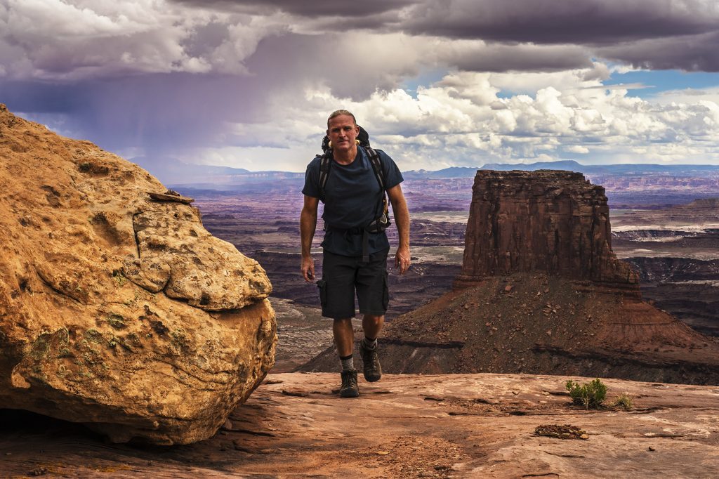 A photo of filmmaker and photographer Gary Orona while on location in wilderness.