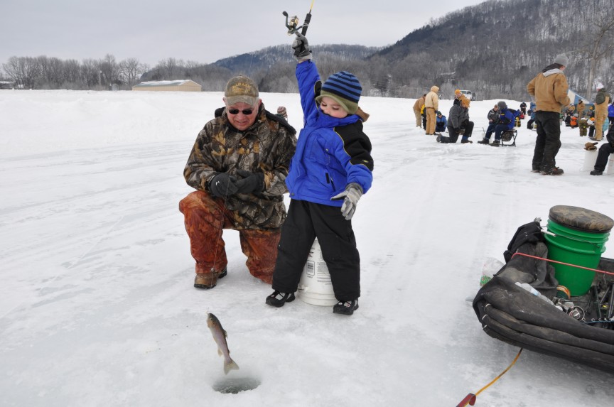 Teaching younger generations how to ice fish. Great catch!