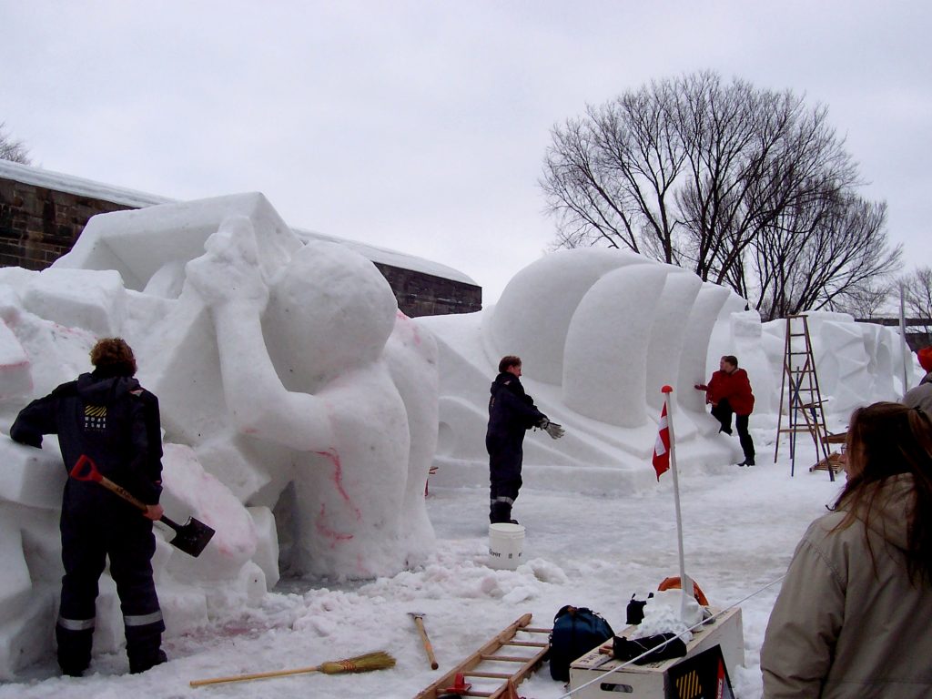 Carnaval de Québec and people making igloos out of snow.