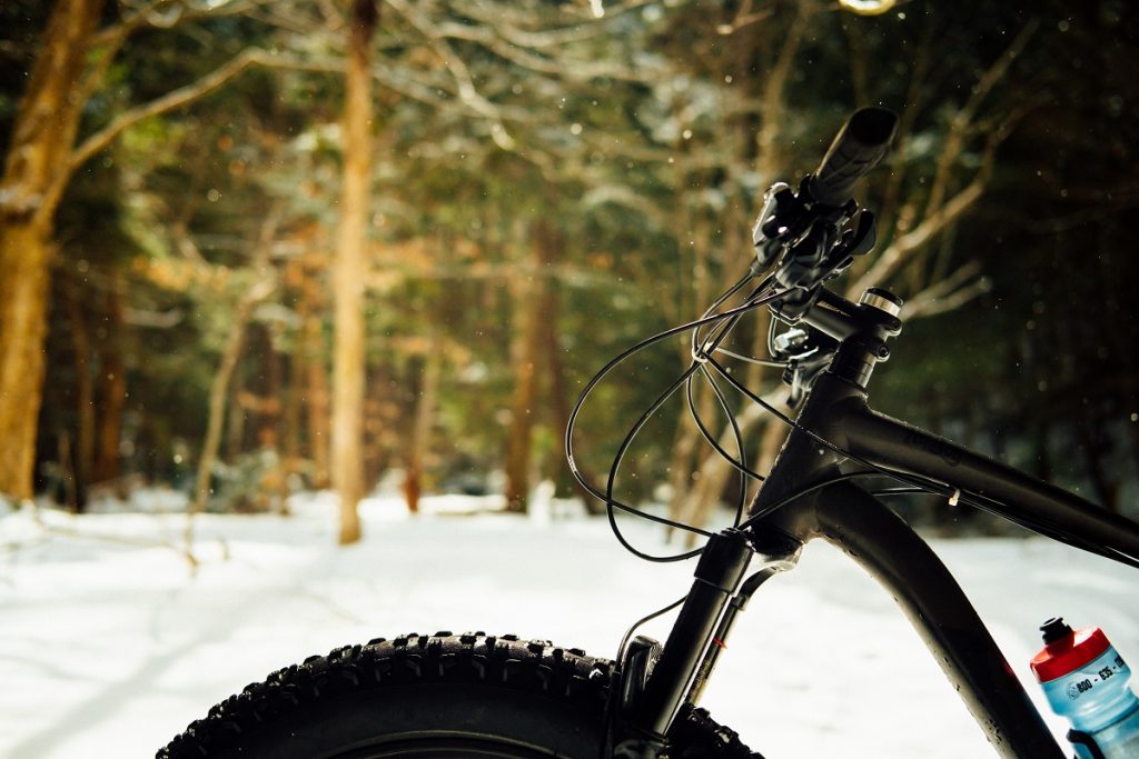 black bike on snow ground