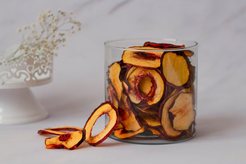 dried peach slices in a glass jar