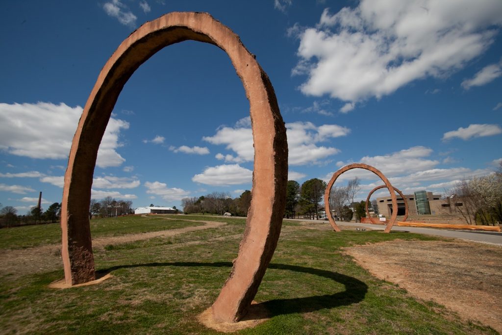 ceramic hoops sculpture on a field