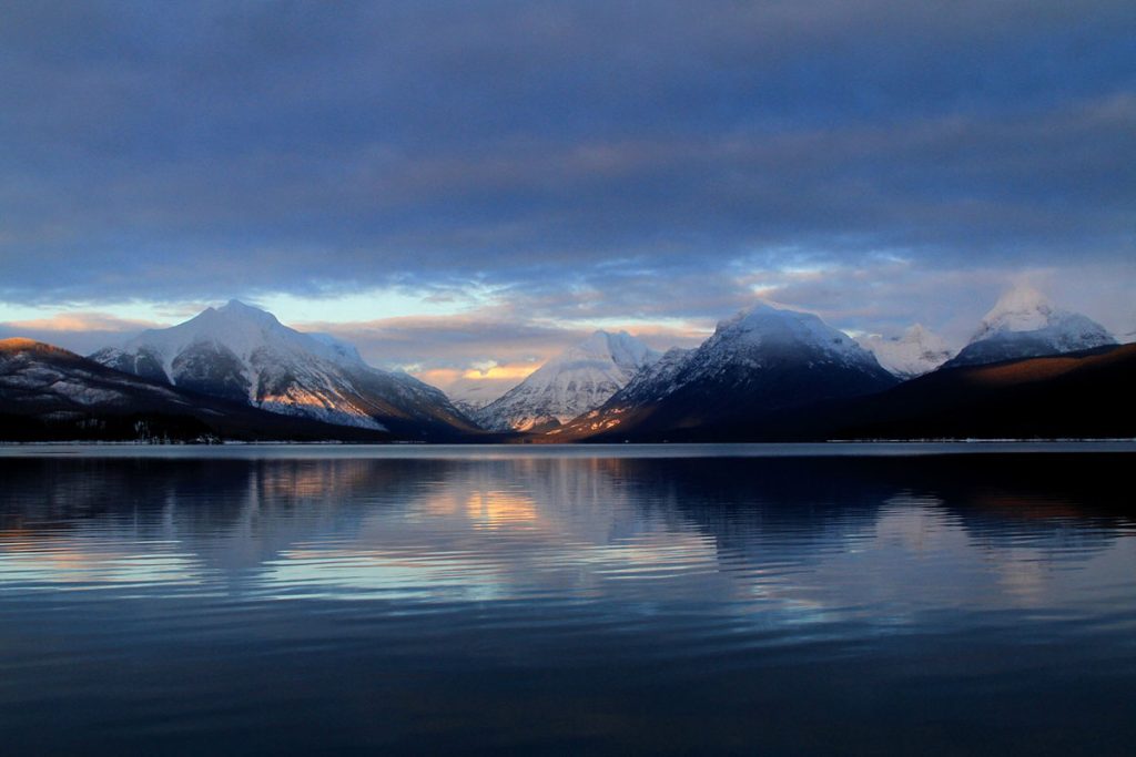 Sunset on Lake McDonald and mountains