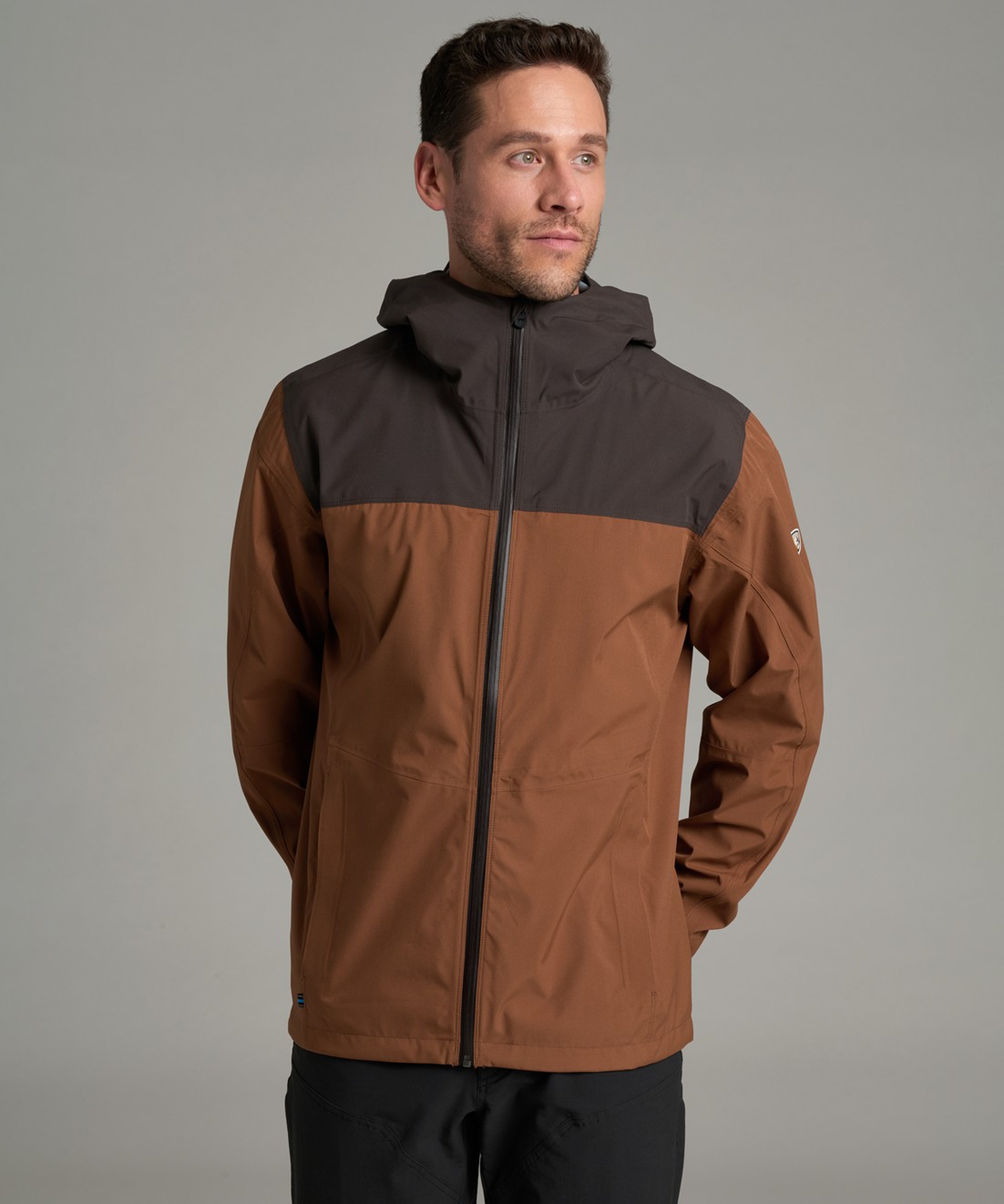 KUHL M's Stretch Voyagr Jacket Saddle Brown / Brackish Front